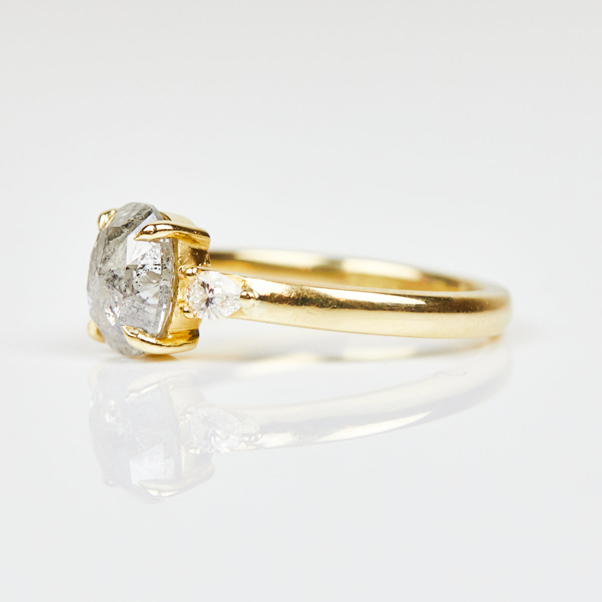 18ct yellow gold salt and pepper oval diamond engagement trilogy ring