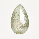 Handcrafted elongated pear-shaped rose-cut light grey salt and pepper diamond.