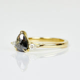 18ct yellow gold salt and pepper pear diamond engagement trilogy ring