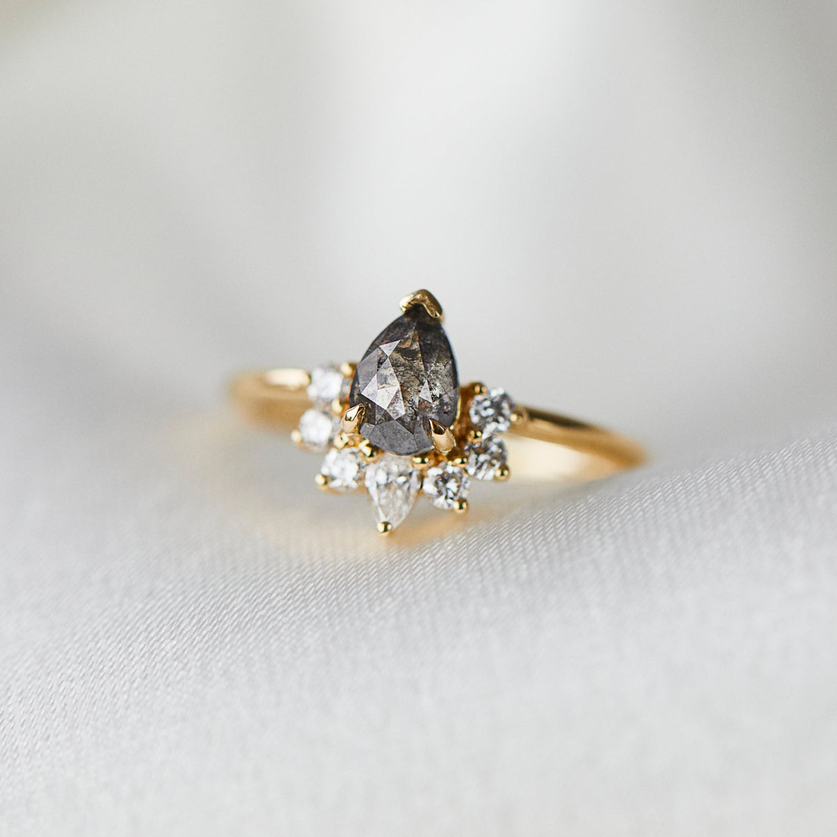 18ct yellow gold salt and pepper pear diamond engagement trilogy ring