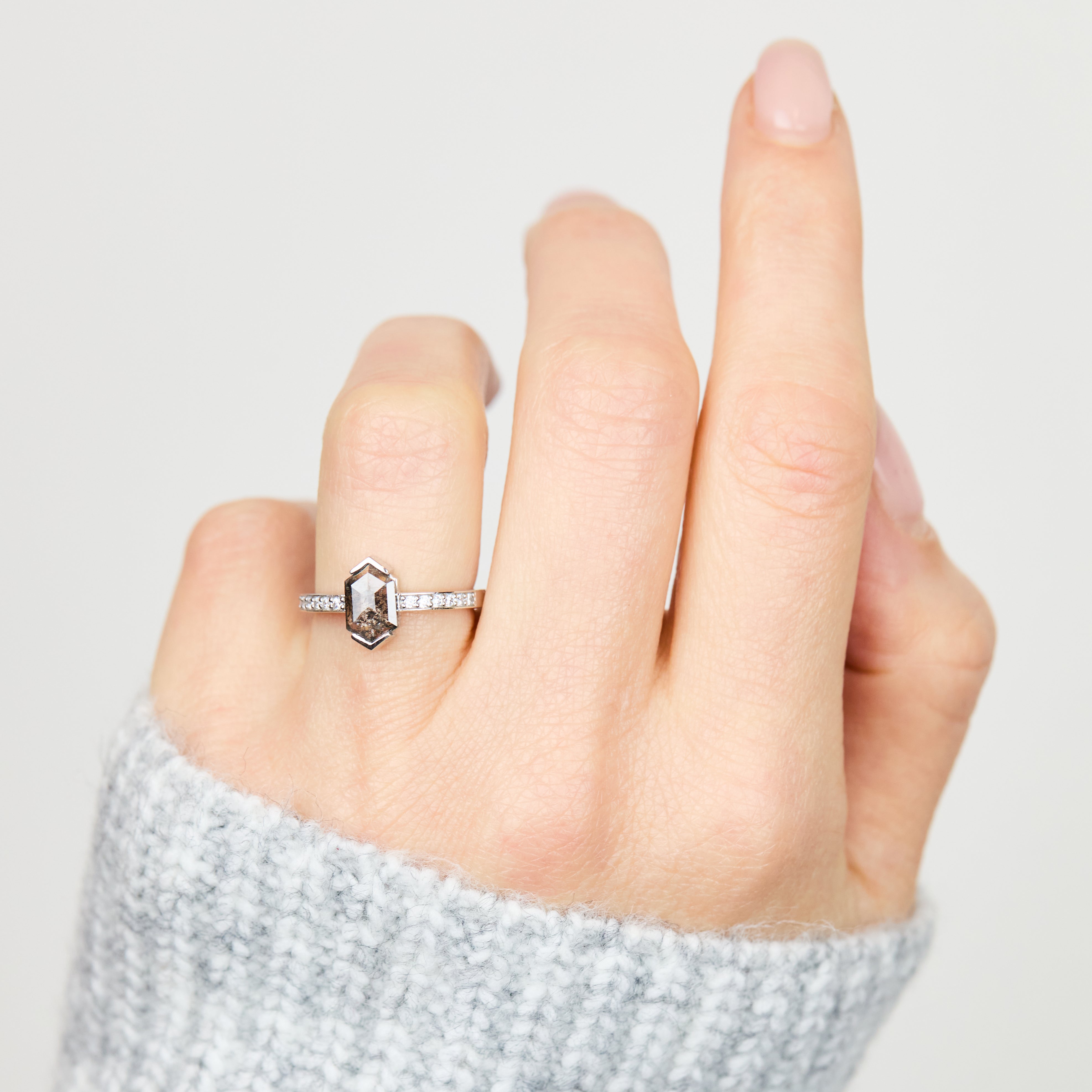 Platinum salt and pepper hexagon diamond engagement pavé ring