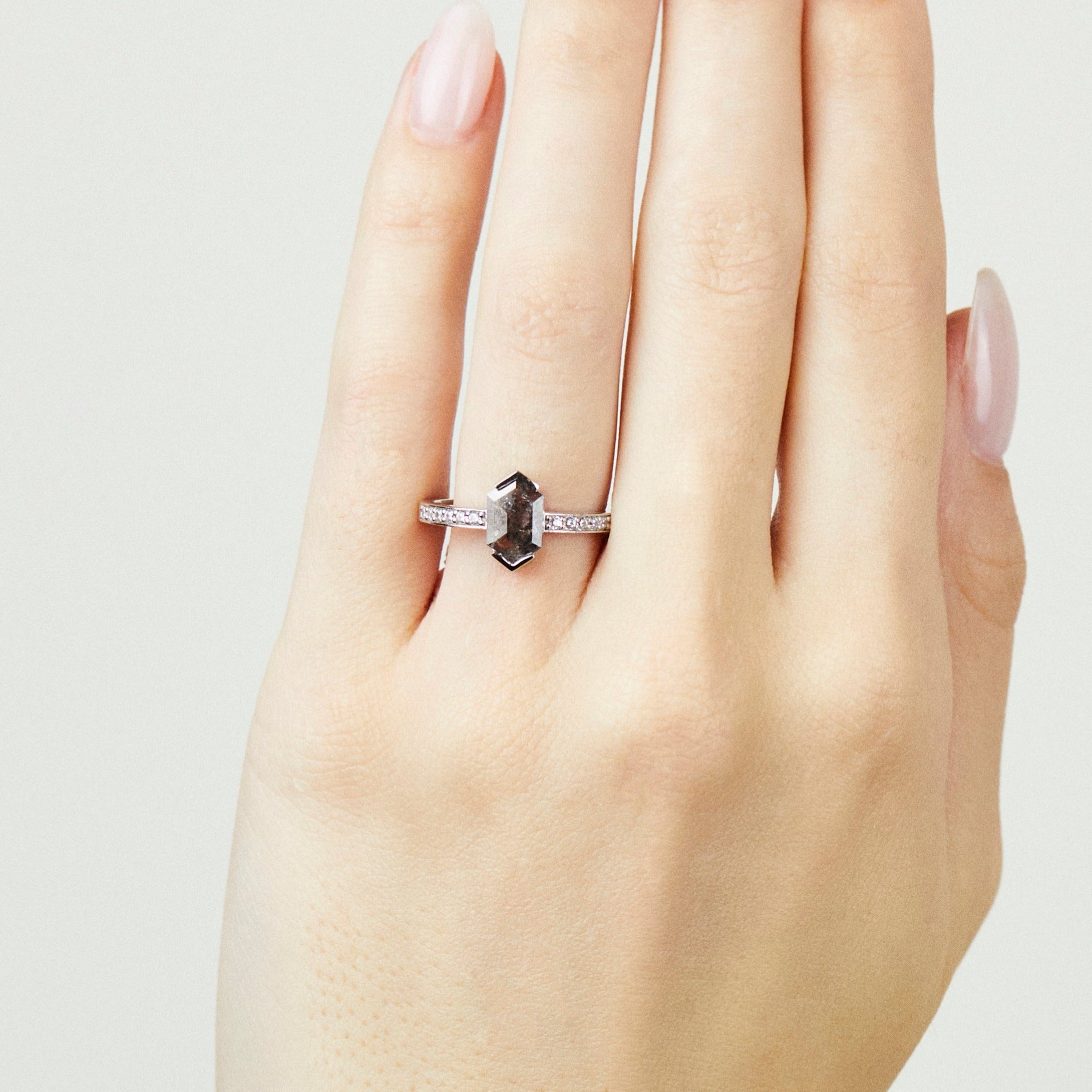 Platinum salt and pepper hexagon diamond engagement pavé ring