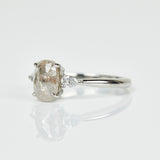 Platinum salt and pepper oval diamond engagement trilogy ring