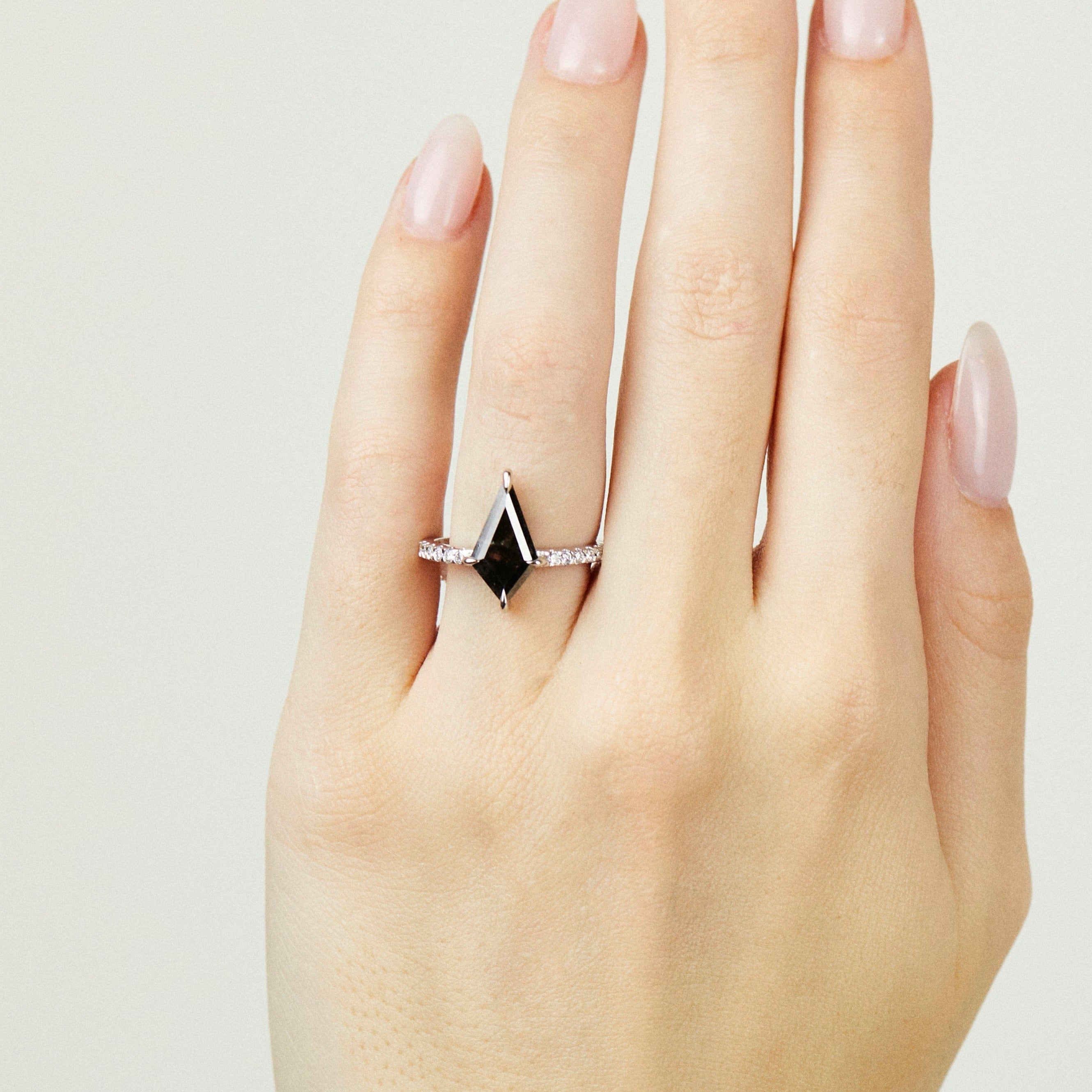 Platinum salt and pepper kite diamond engagement pavé ring