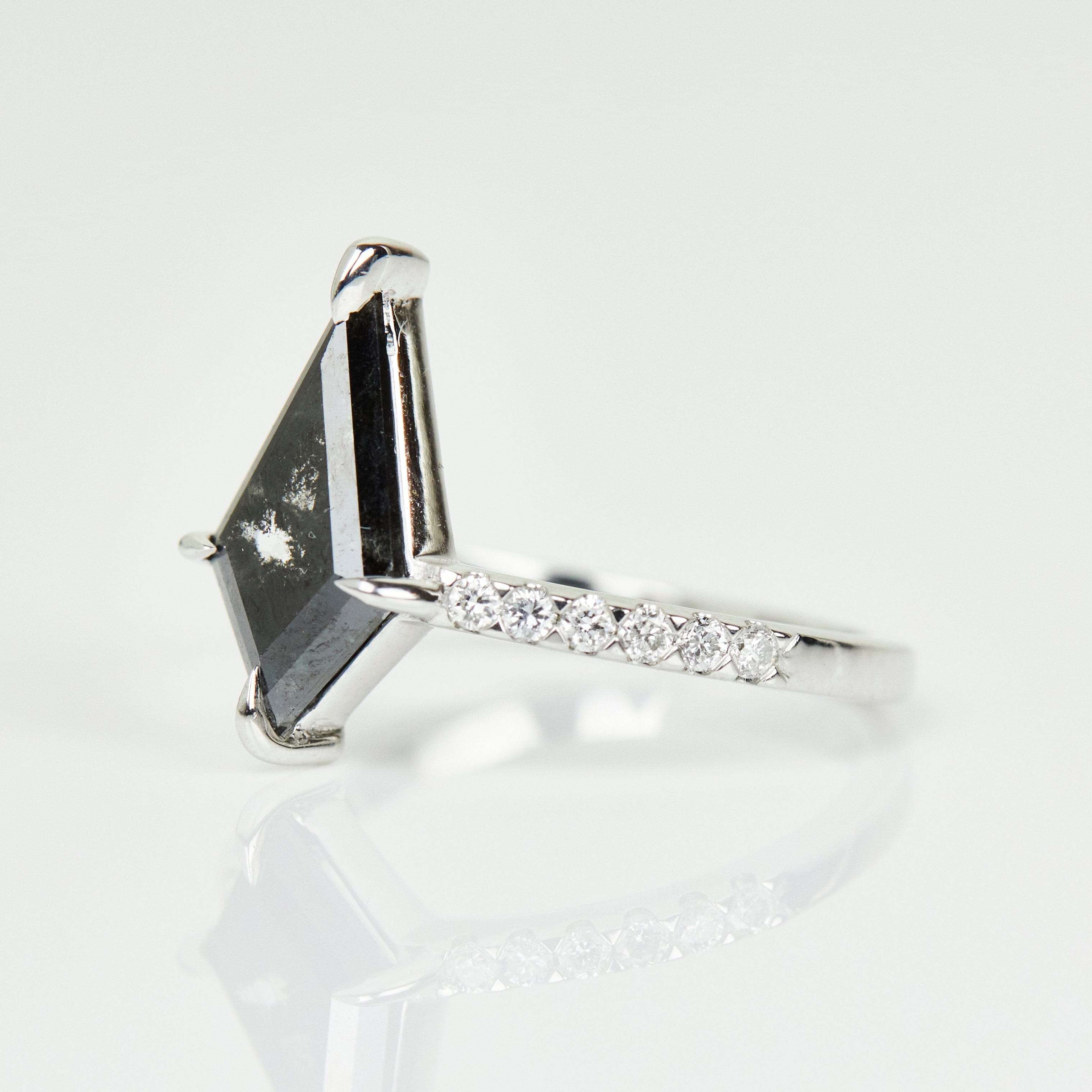 Platinum salt and pepper kite diamond engagement pavé ring