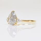 18ct yellow gold salt and pepper pear diamond engagement trilogy ring