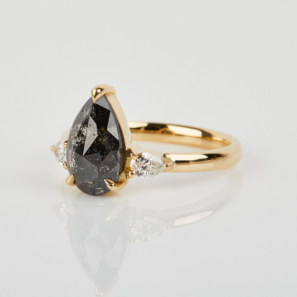 18ct yellow gold salt and pepper pear diamond engagement trilogy ring