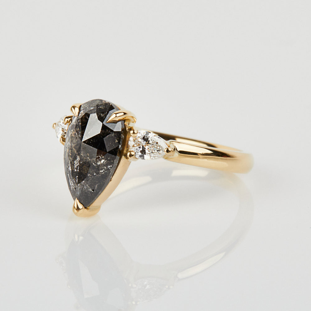 18ct yellow gold salt and pepper pear diamond engagement trilogy ring