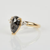 18ct yellow gold salt and pepper pear diamond engagement trilogy ring