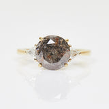 18ct yellow gold salt and pepper round brilliant cut diamond engagement trilogy ring
