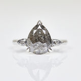 Platinum salt and pepper pear diamond engagement trilogy ring