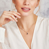Black triangular salt and pepper diamond necklace in platinum.