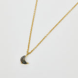 Crescent moon salt and pepper diamond necklace in 18ct yellow gold.