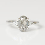 Platinum oval salt and pepper diamond trilogy