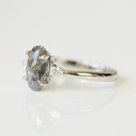 Platinum oval salt and pepper diamond trilogy
