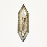 Light grey elongated hexagon rose-cut salt and pepper diamond.