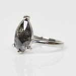 Platinum salt and pepper pear diamond engagement solitaire ring