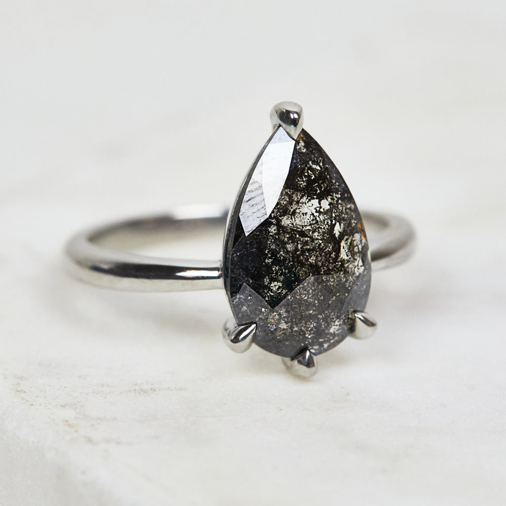 Platinum salt and pepper pear diamond engagement solitaire ring