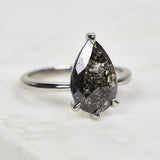 Platinum salt and pepper pear diamond engagement solitaire ring