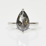 Platinum salt and pepper pear diamond engagement solitaire ring