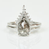 Platinum salt and pepper pear diamond engagement trilogy ring