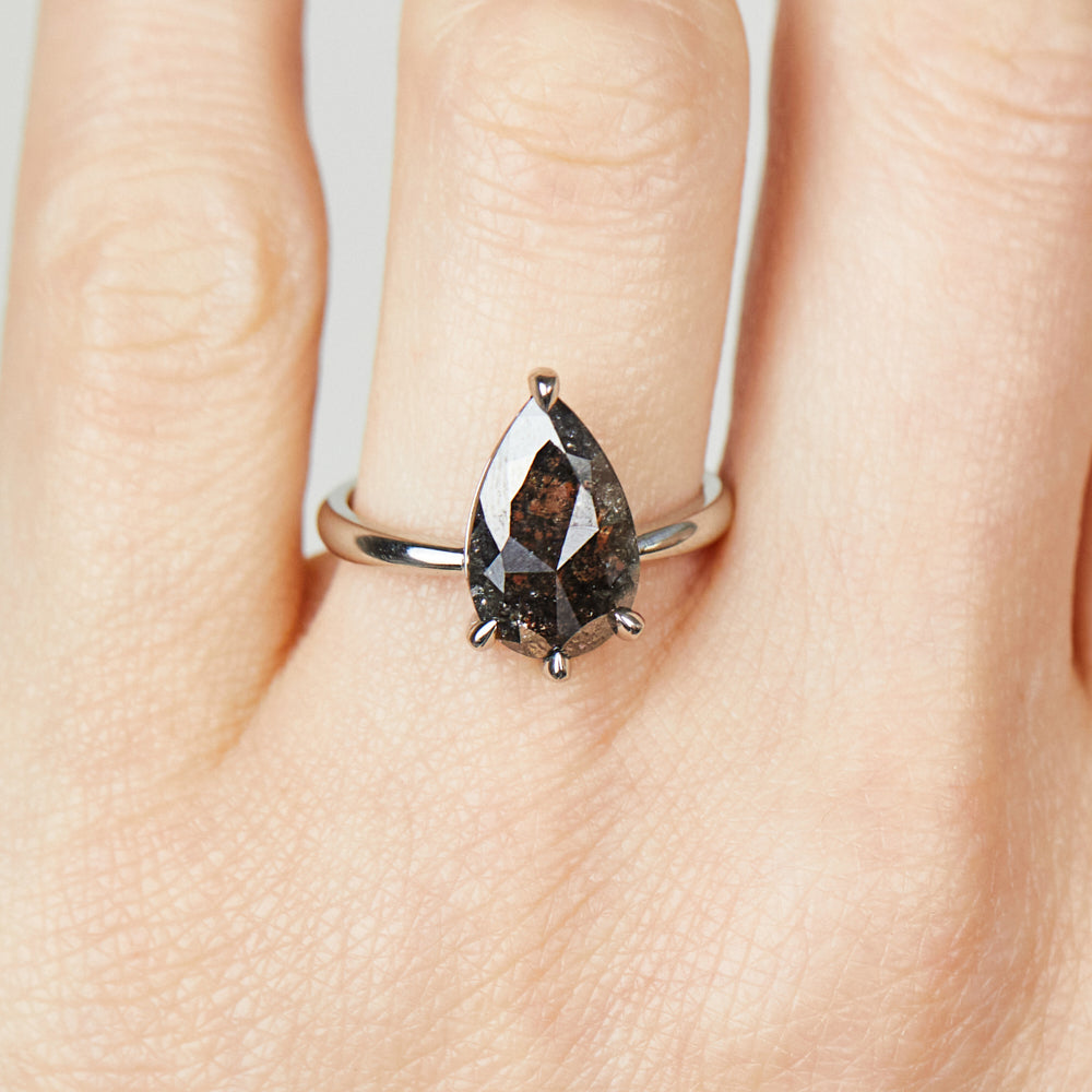 Platinum salt and pepper pear diamond engagement solitaire ring