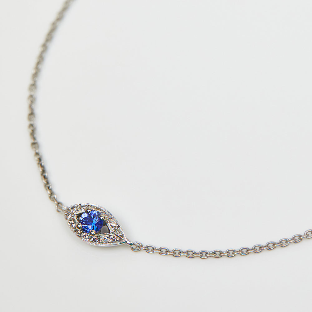 Sapphire evil eye bracelet with diamonds in 18ct white gold.