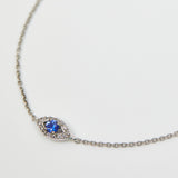 Sapphire evil eye bracelet with diamonds in 18ct white gold.