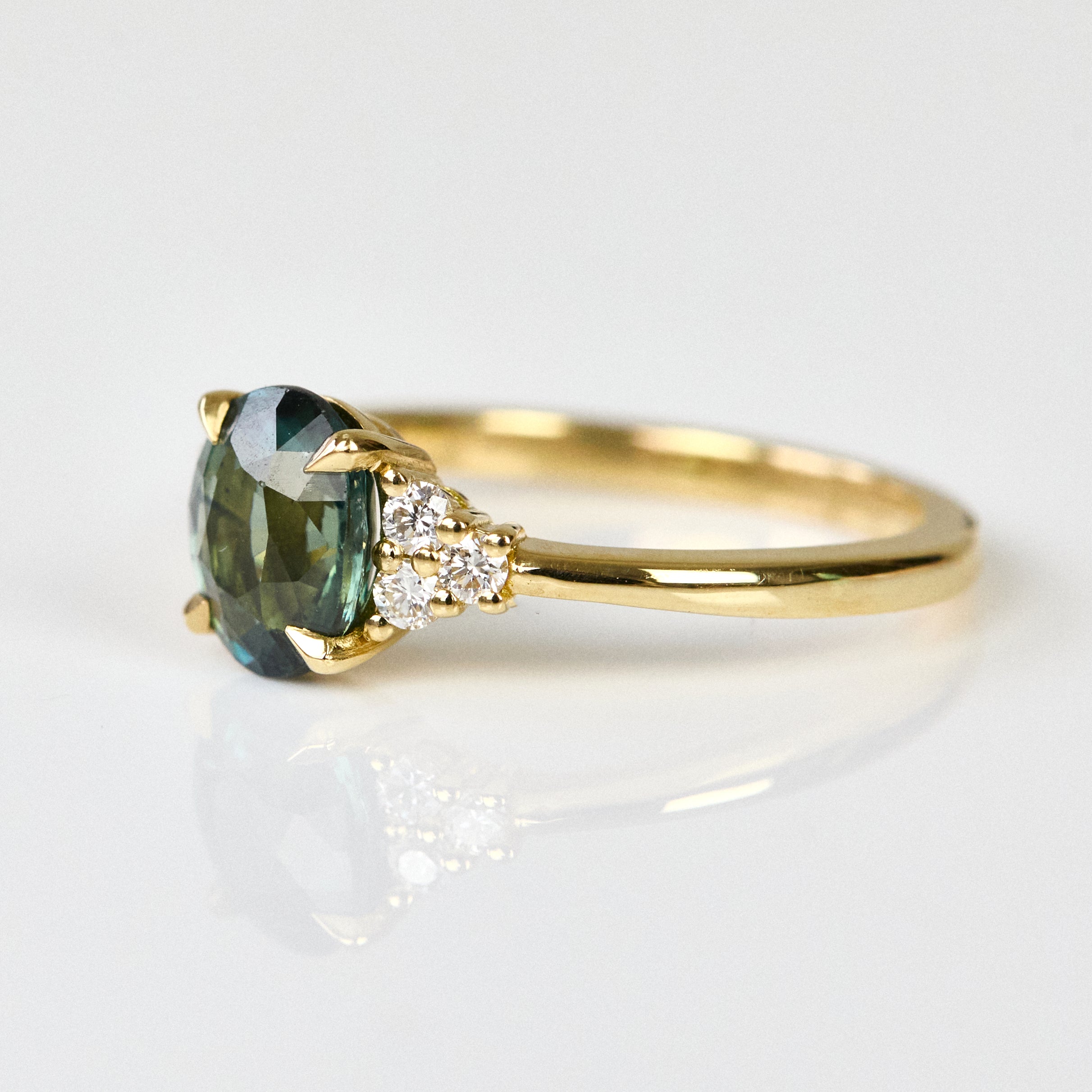 Teal sapphire rings