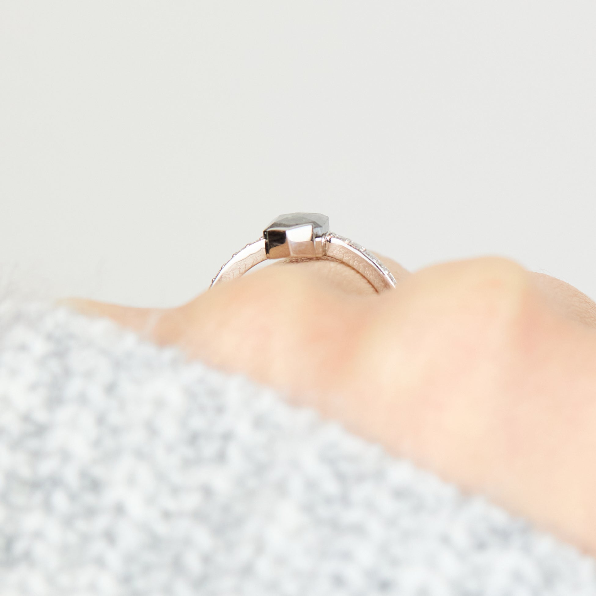 Platinum salt and pepper hexagon diamond engagement pavé ring