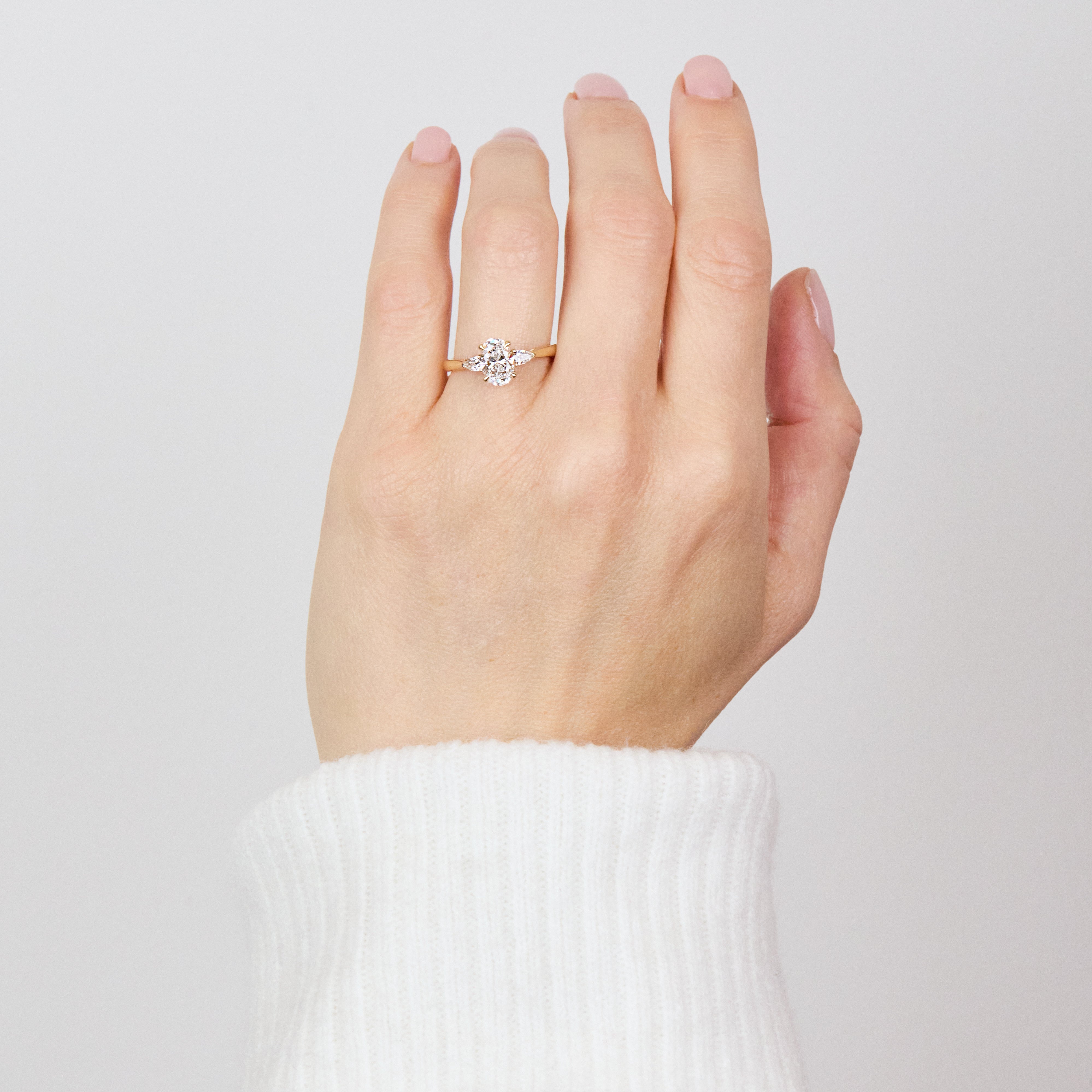 oval lab grown diamond yellow gold engagement ring