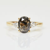 18ct yellow gold salt and pepper oval diamond engagement trilogy ring