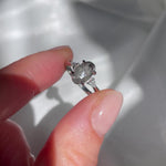 Platinum oval salt and pepper diamond trilogy