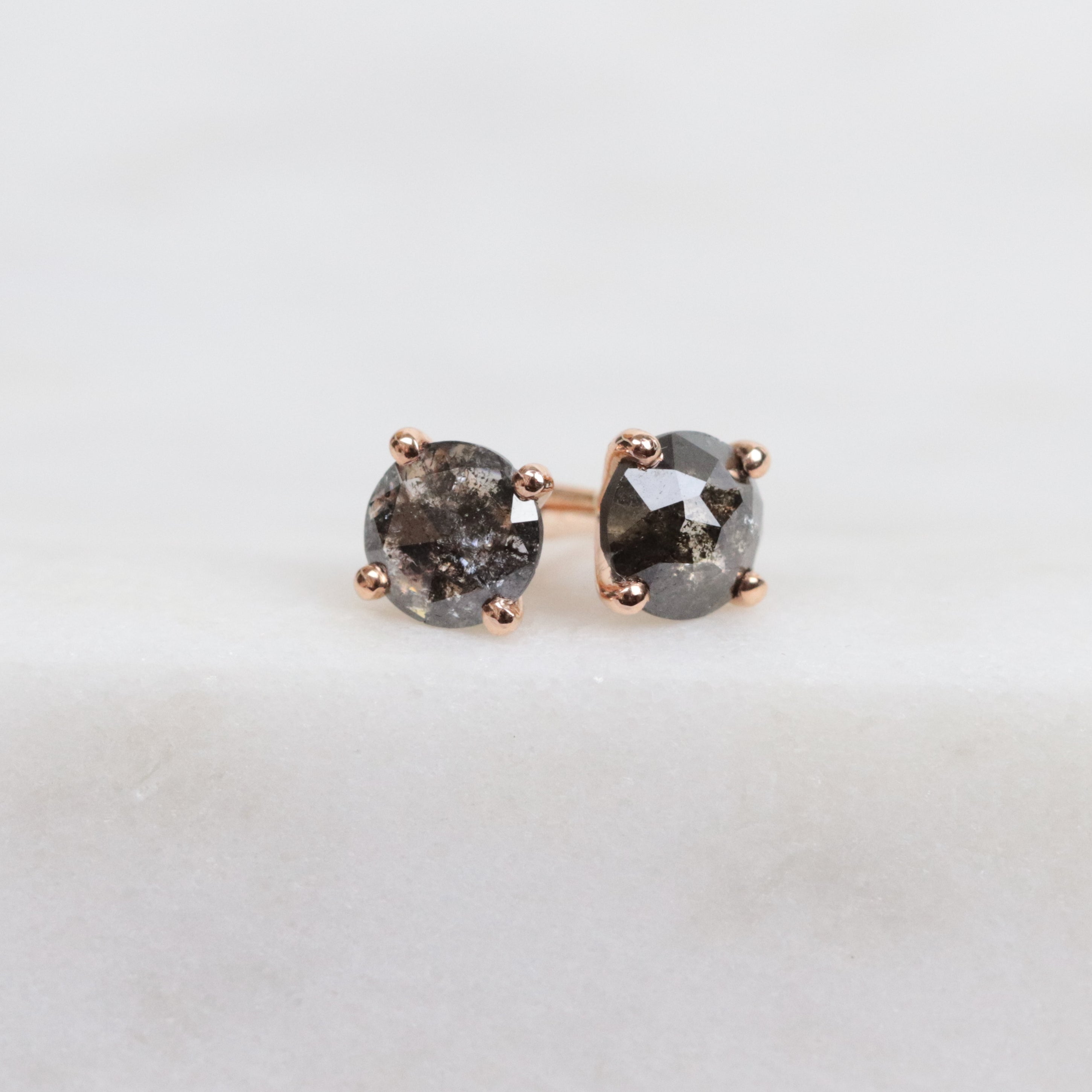 Dark and stormy salt and pepper diamond studs set in 18ct rose gold