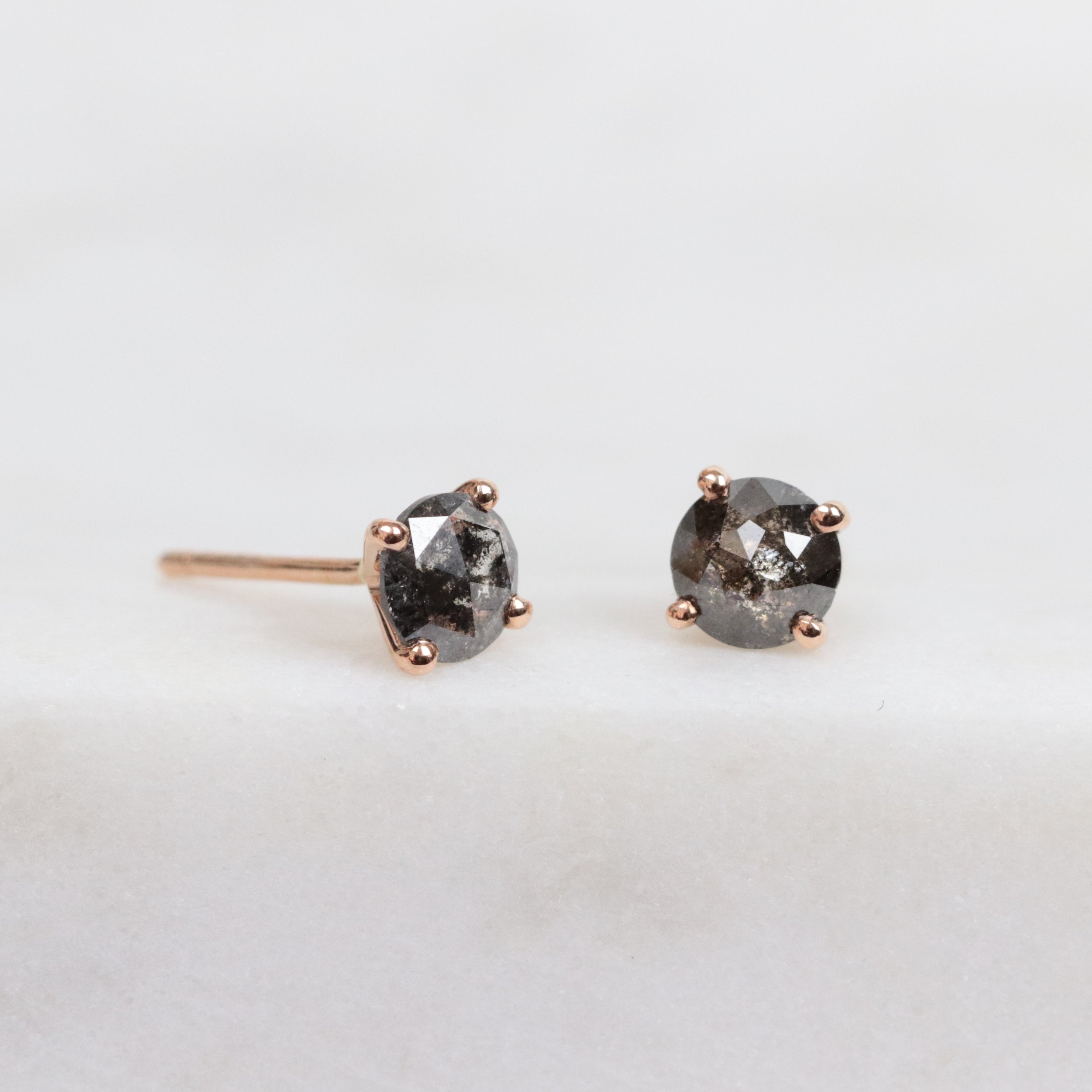 Dark and stormy salt and pepper diamond studs set in 18ct rose gold