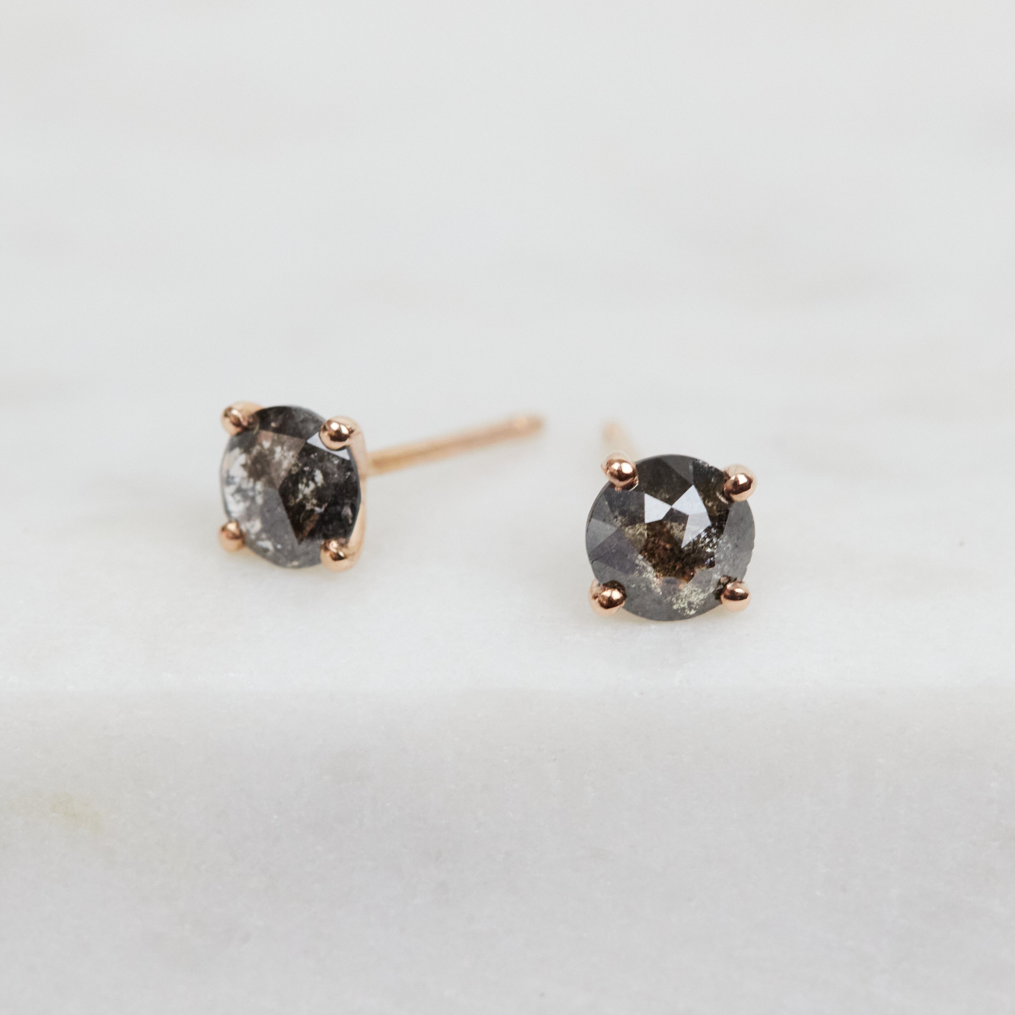 Dark and stormy salt and pepper diamond studs set in 18ct rose gold