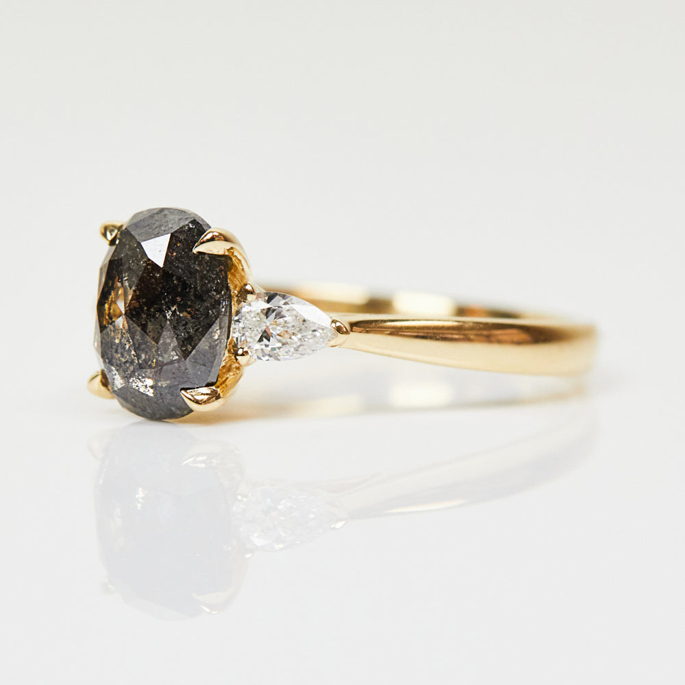18ct yellow gold salt and pepper oval diamond engagement trilogy ring