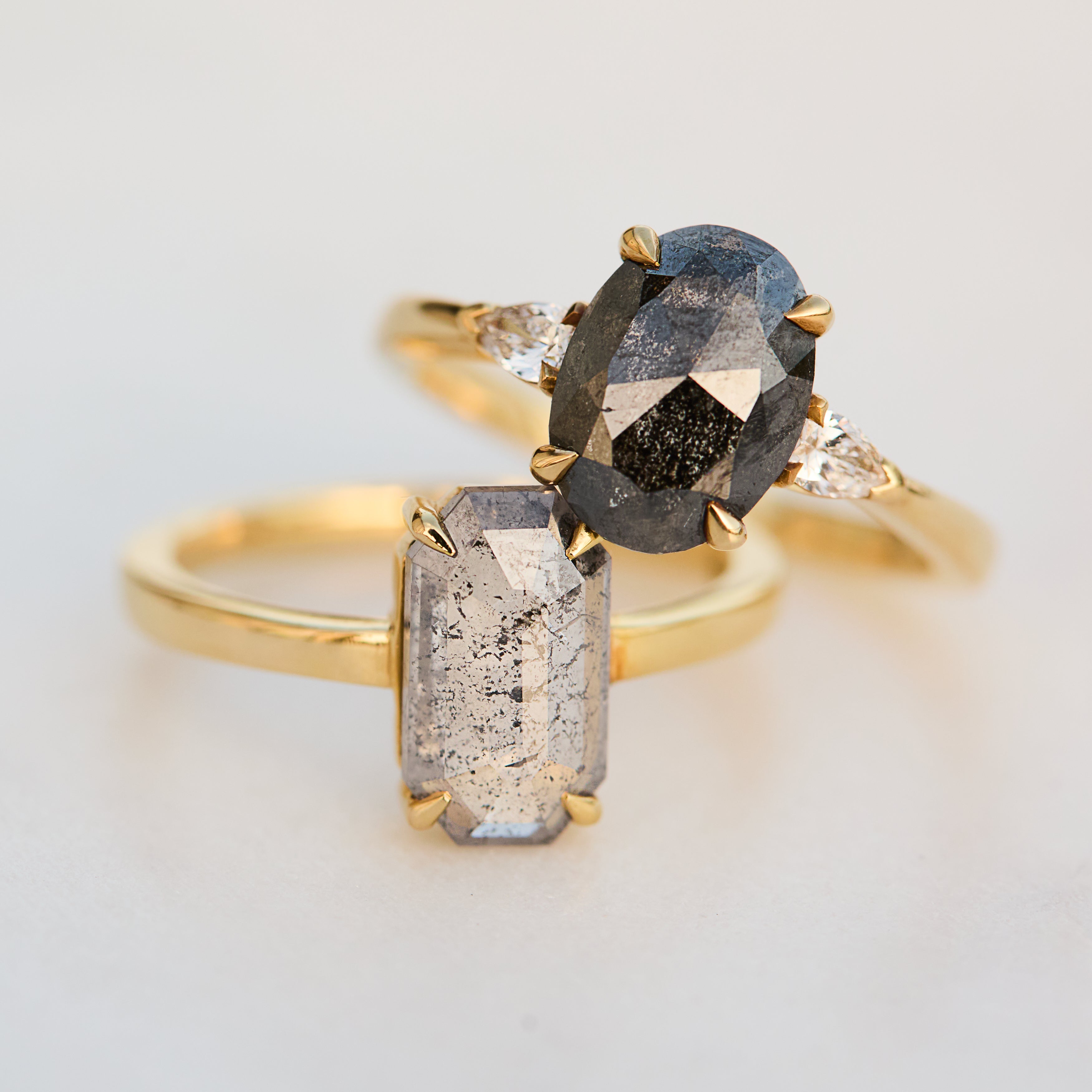 yellow gold four claw set diamond rings