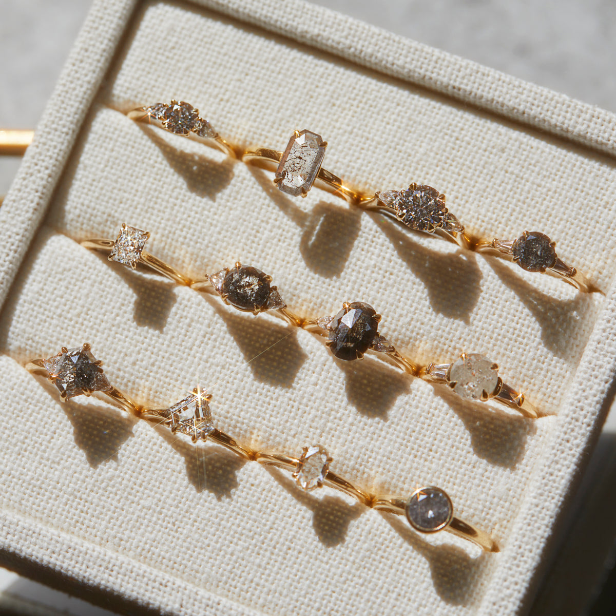 18ct yellow gold salt and pepper round brilliant cut diamond engagement bezel ring