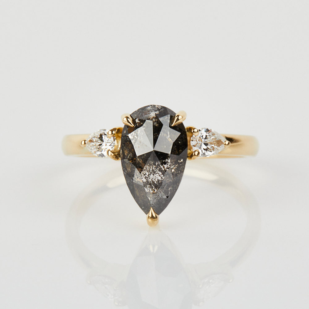18ct yellow gold salt and pepper pear diamond engagement trilogy ring