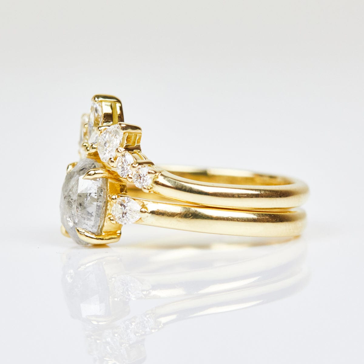 18ct yellow gold salt and pepper oval diamond engagement trilogy ring