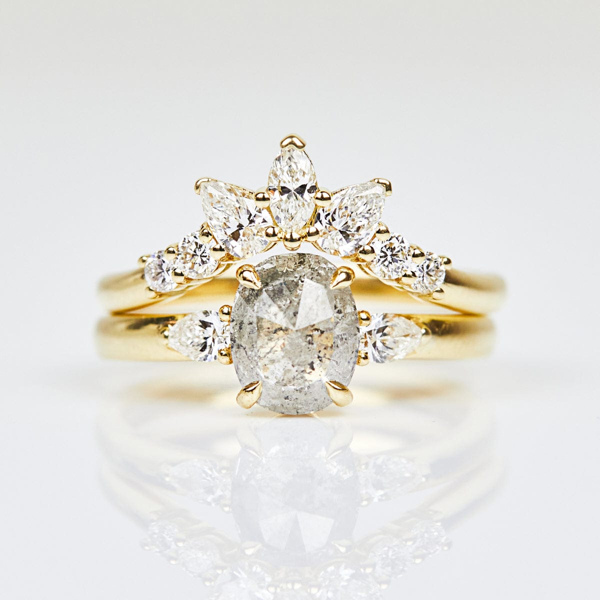 18ct yellow gold salt and pepper oval diamond engagement trilogy ring