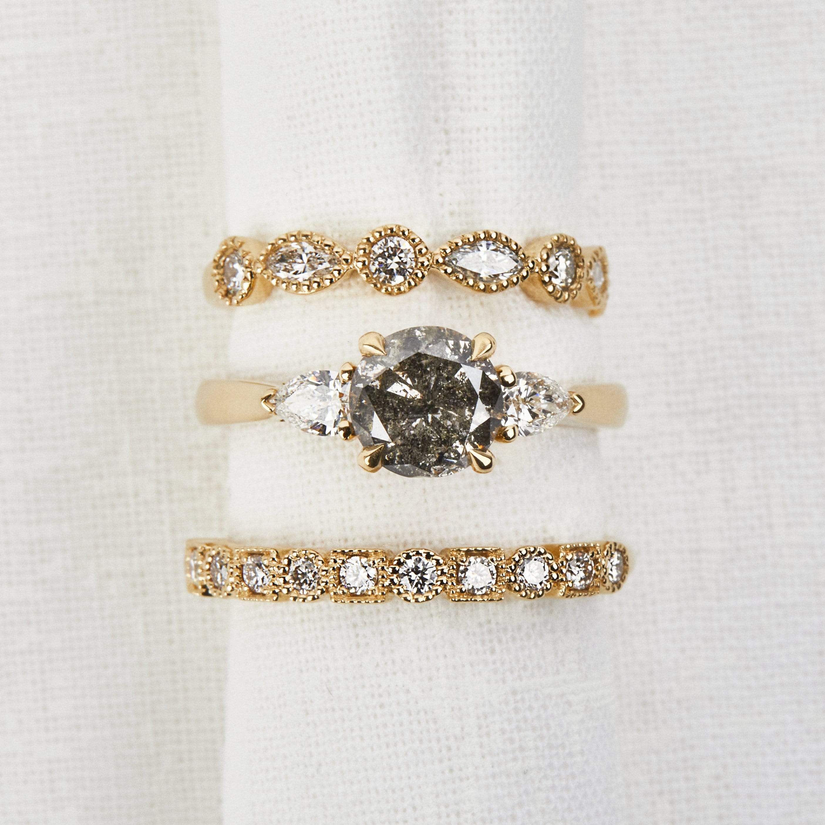 18ct yellow gold salt and pepper brilliant round cut diamond engagement trilogy ring