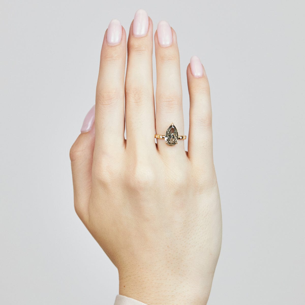 18ct yellow gold salt and pepper pear diamond engagement solitaire ring