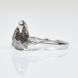 Platinum salt and pepper pear diamond engagement trilogy ring