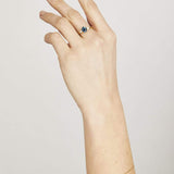Blue sapphire evil eye bracelet with diamonds in 18ct yellow gold.