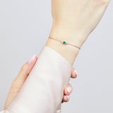 Green sapphire evil eye bracelet with diamonds in 18ct white gold.