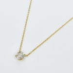 Round brilliant cut salt and pepper diamond necklace in 18ct yellow gold.