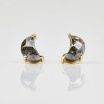 Salt and pepper crescent moon diamond earrings in yellow gold.