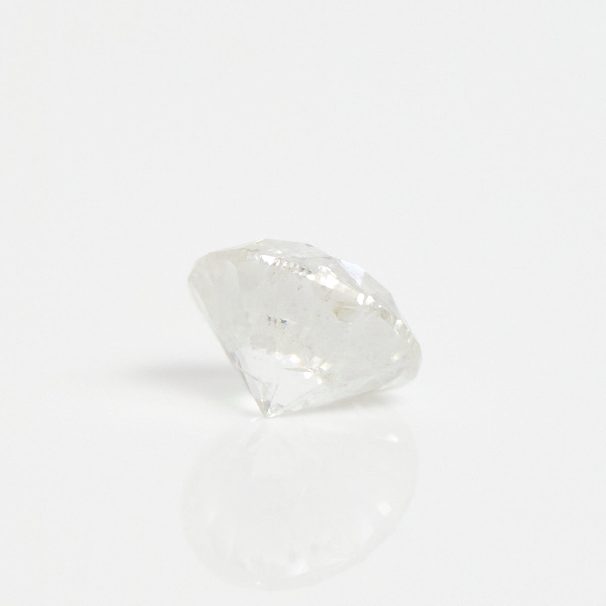 Icy white round brilliant-cut rustic diamond.